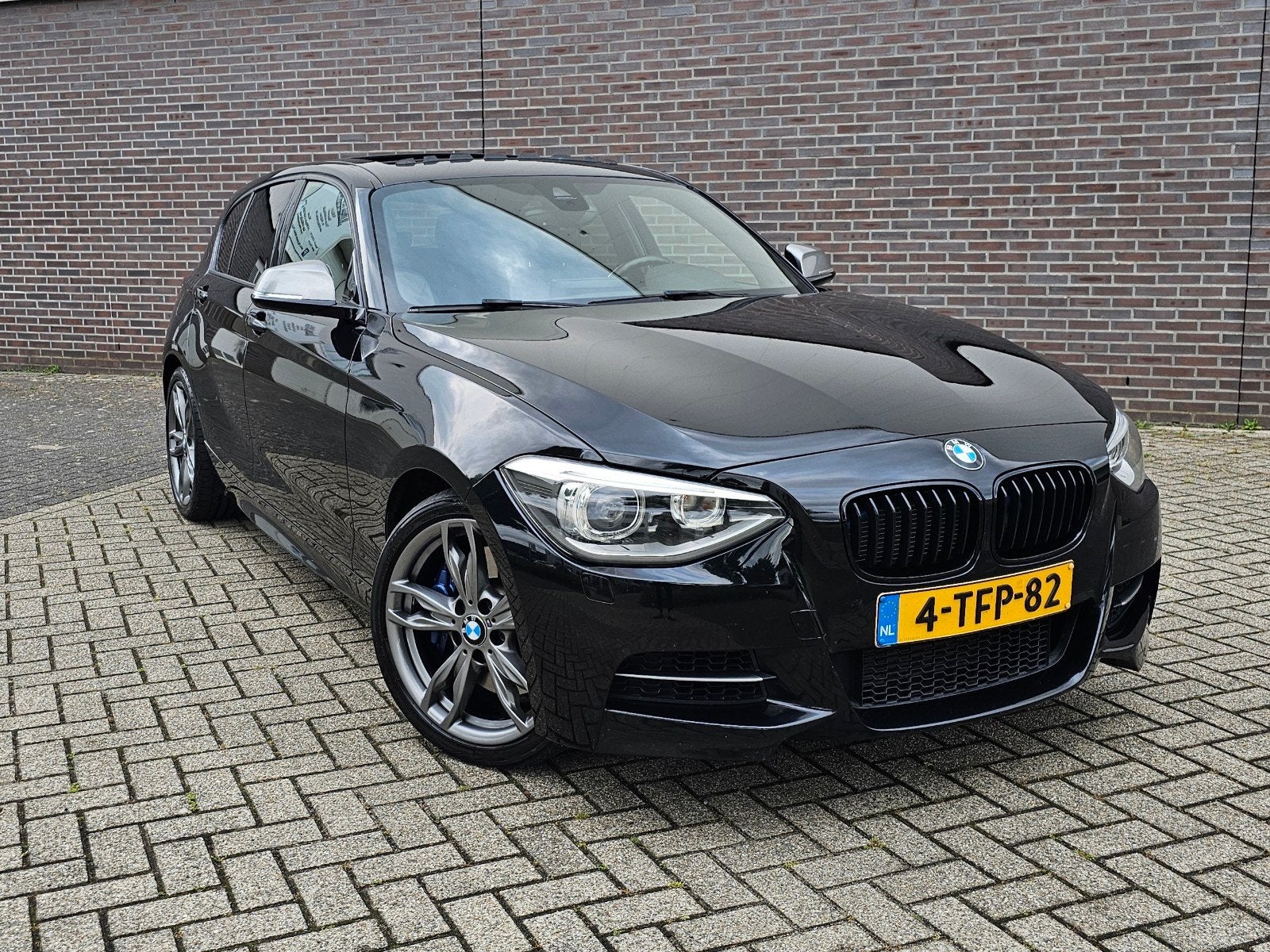 M135i xDrive l AC Schnitzer upg. l NAP l zeer compleet, Zwart, Zwart, Leder, Vierwielaandrijving