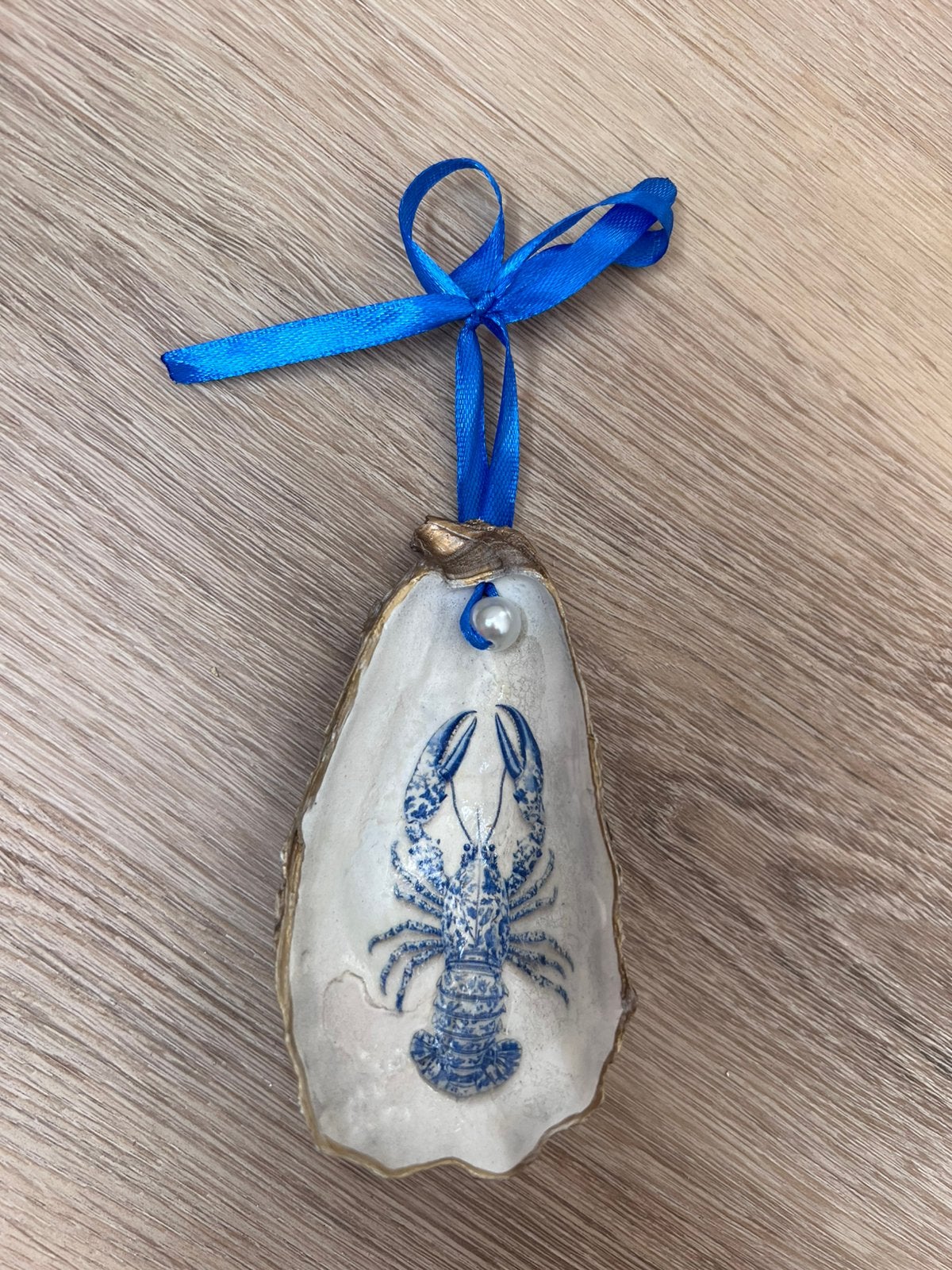 Oesterschelp met blauwe kreeft, Ophalen of Verzenden, Schelp(en)