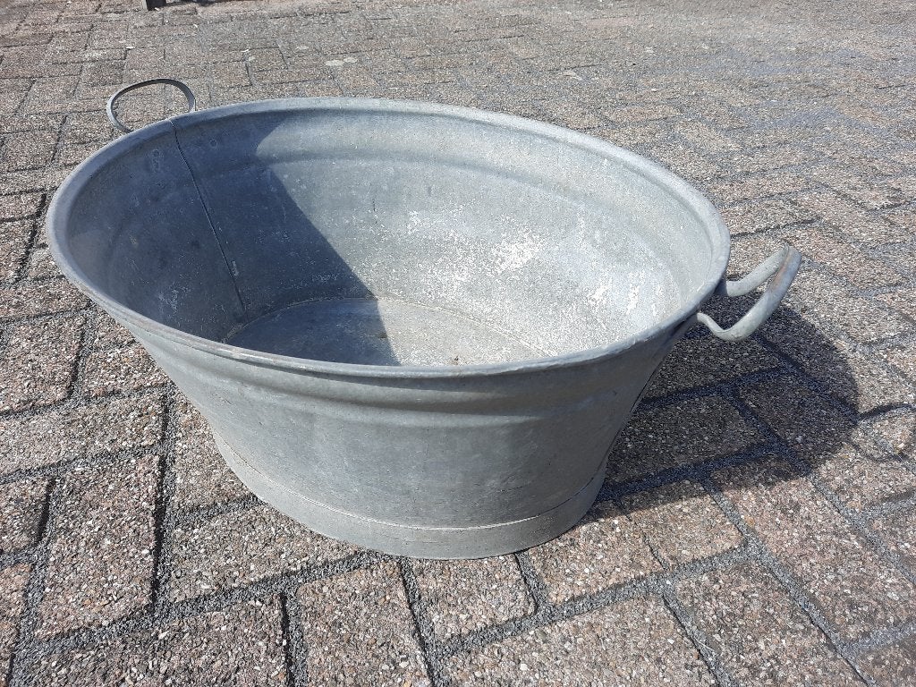 Brocante teil van zink, Ophalen