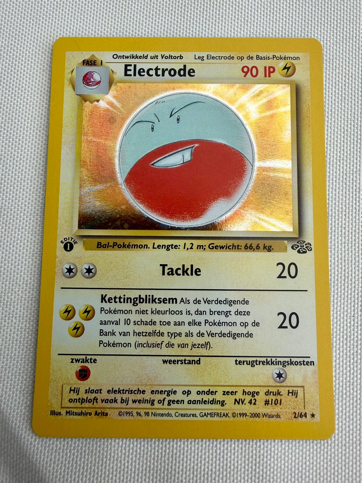 Electrode 2/64 Holo 1st Edition Nederlands Pokémon Kaart, Ophalen of Verzenden, Gebruikt, Losse kaart, Foil