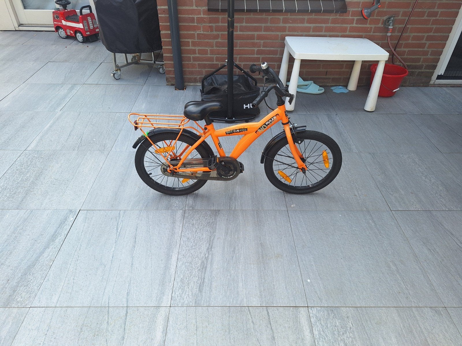 kinderfiets oranje, Terugtraprem, Gebruikt, Heren, 18 tot 20 inch