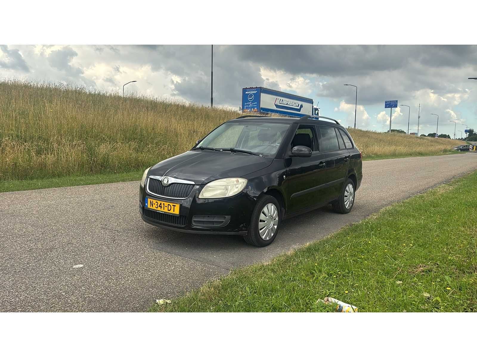 Skoda Fabia Combi 1.2-12V Go 2010 | N-341-DT i, Auto's, Voorwielaandrijving, 450 kg, 1198 cc, Zwart