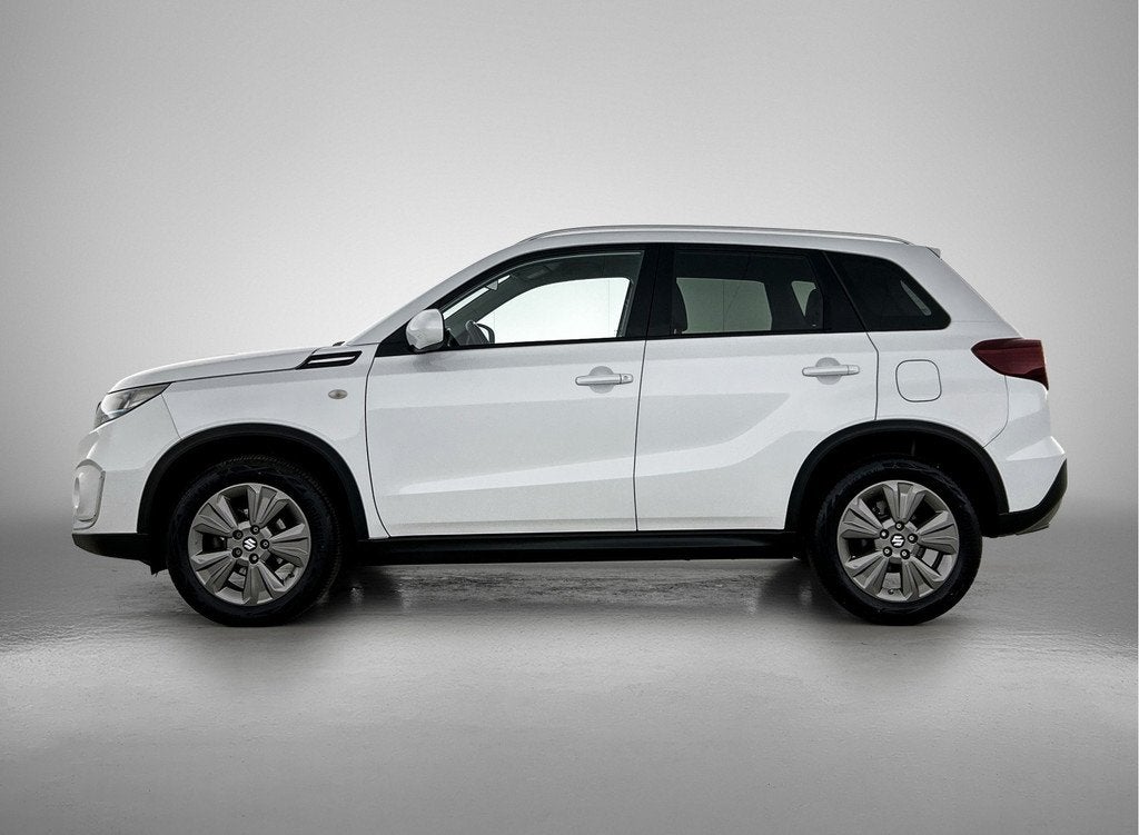 Suzuki Vitara 1.4 Boosterjet Select Smart Hybrid (bj 2023), Auto's, 12 maanden, Stof, Gebruikt, Wit