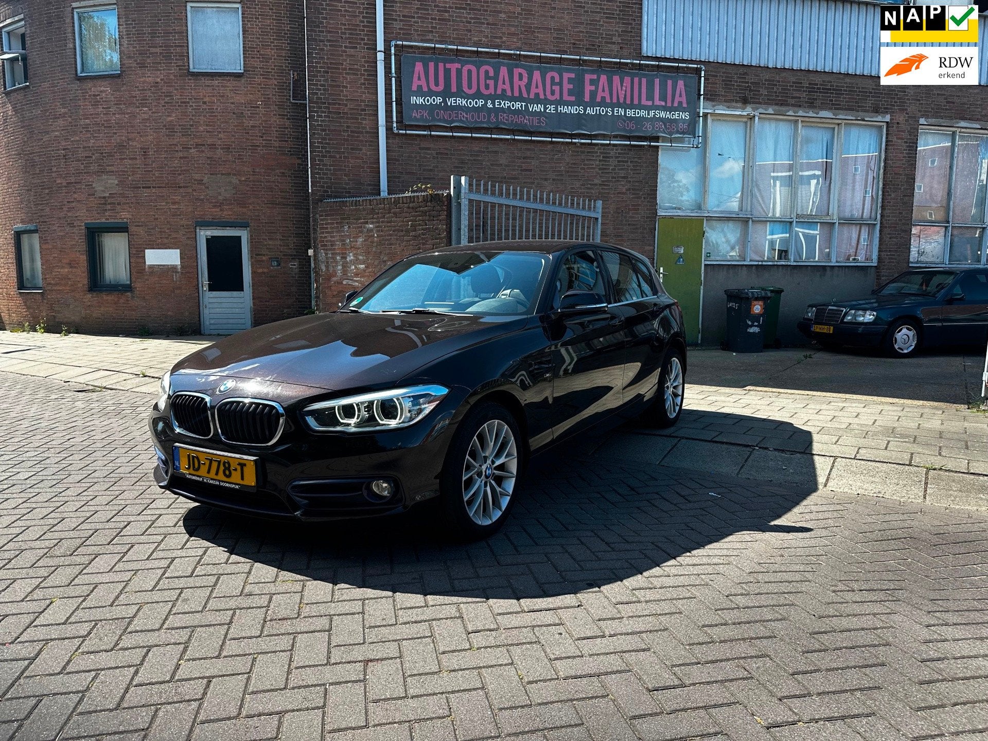 BMW 1-serie 118i Sport, Gebruikt, 4 cilinders, Bruin, Origineel Nederlands