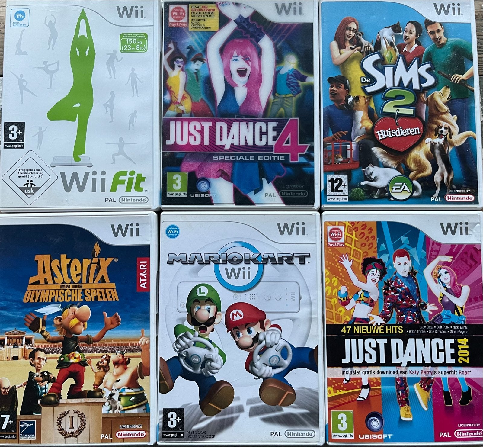 6 Wii spellen: Asterix, Just Dance, Mario Kart, De Sims, Avontuur en Actie, Gebruikt, 1 speler, Eén computer