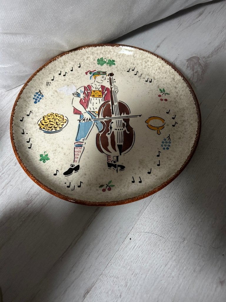 wandbordje man met viool, Huis en Inrichting, Woonaccessoires | Wanddecoraties, Ophalen of Verzenden, Gebruikt, Steen/keramiek