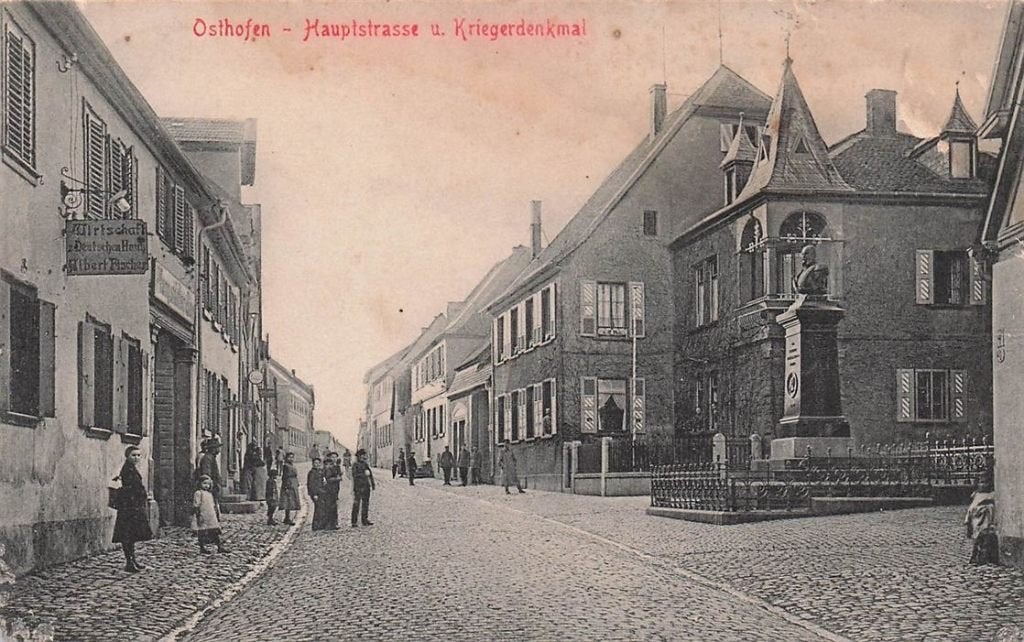 703-164-001 Osthofen Hauptstrasse und Kriegerdenkmal, Verzenden, Voor 1920, Duitsland
