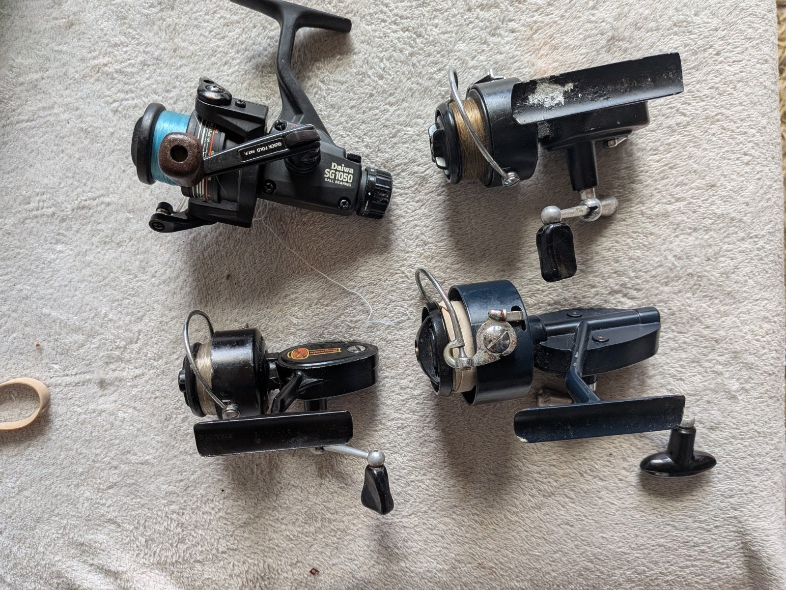 Partij vintage werpmolens visreels - Mitchell, Daiwa,, Ophalen of Verzenden, Gebruikt, Molen