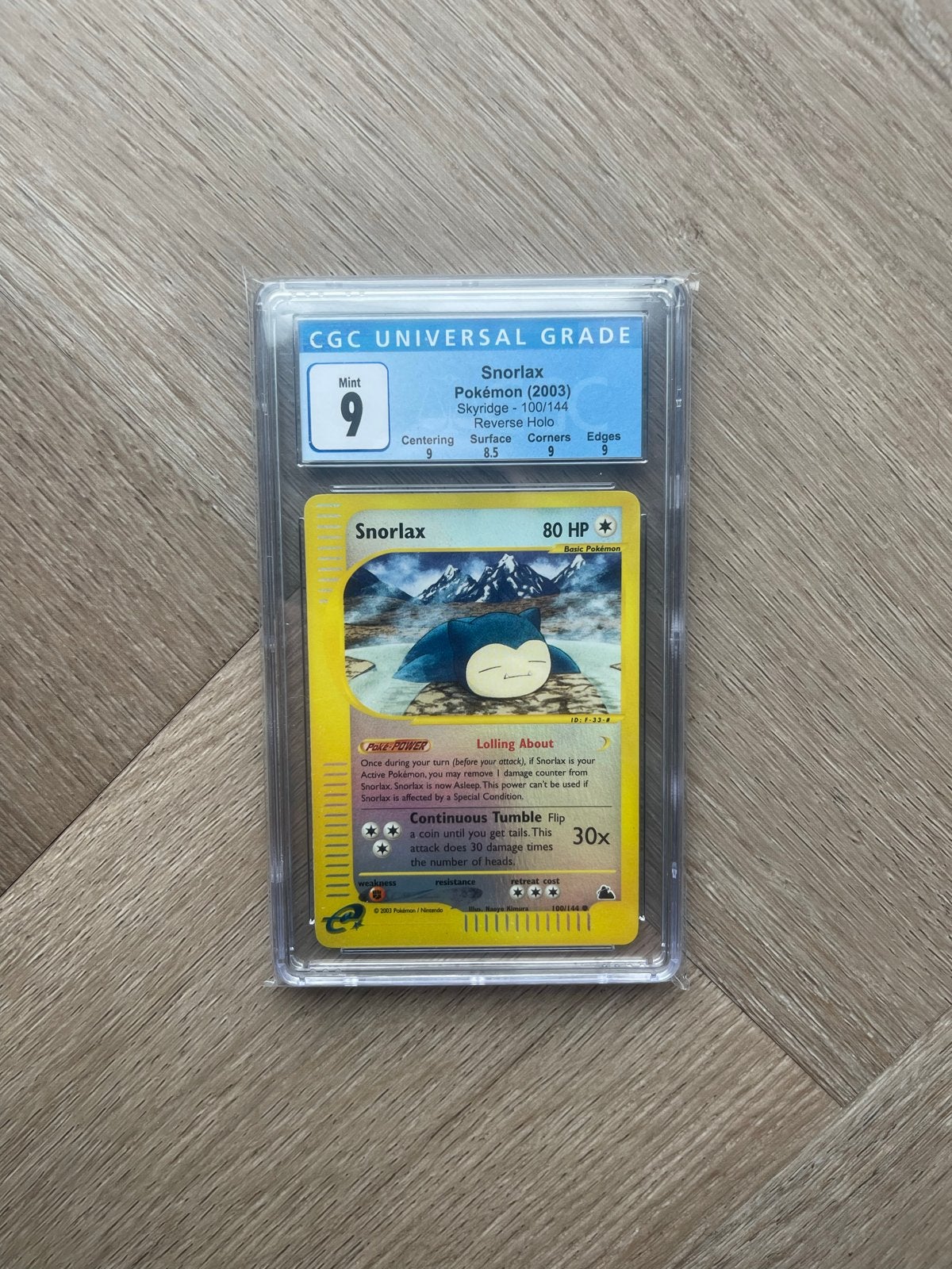 Snorlax Skyridge Reverse Holo CGC 9 100/144 Pokémon PSA, Ophalen of Verzenden, Zo goed als nieuw, Losse kaart, Foil