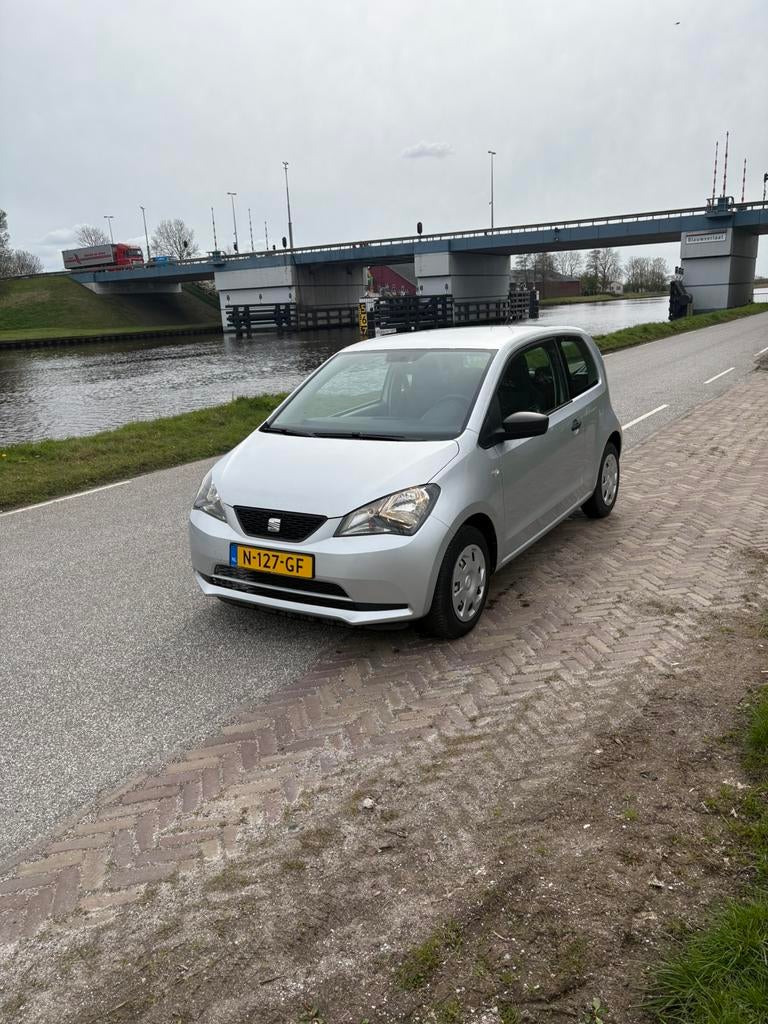 Seat Mii 1.0 44KW 2012 nieuwe apk, Auto's, Voorwielaandrijving, Stof, Zwart, 4 cilinders
