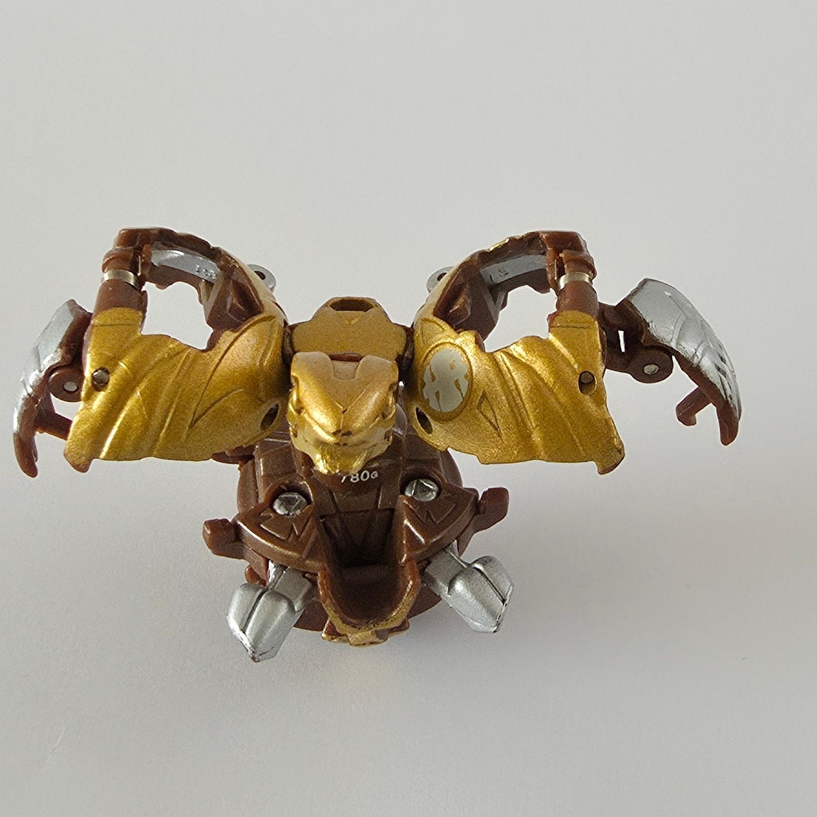Bakugan Dragonoid Gold/Bruin 780G, Kinderen en Baby's, Speelgoed | Actiefiguren, Ophalen of Verzenden, Gebruikt