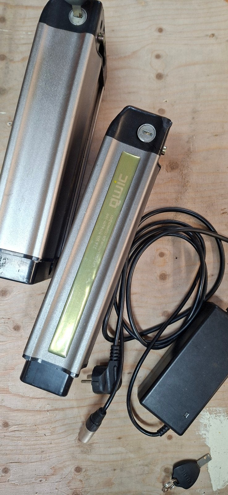 2 . qwic lithium accu's met oplader, Fietsen en Brommers, Gebruikt