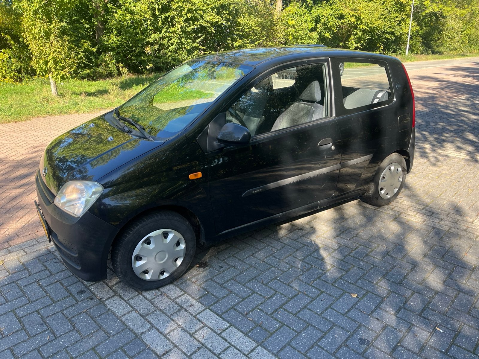 Daihatsu Cuore 1.0 Osaka 3D 2007 Zwart, Auto's, Stof, 600 kg, 18 €/maand, ABS