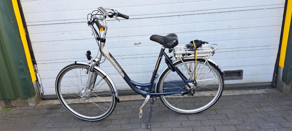 Zeer nette Bikkel elektrische fiets 176km nieuwe accu, Fietsen en Brommers, Zo goed als nieuw, 50 km per accu of meer, 55 tot 59 cm