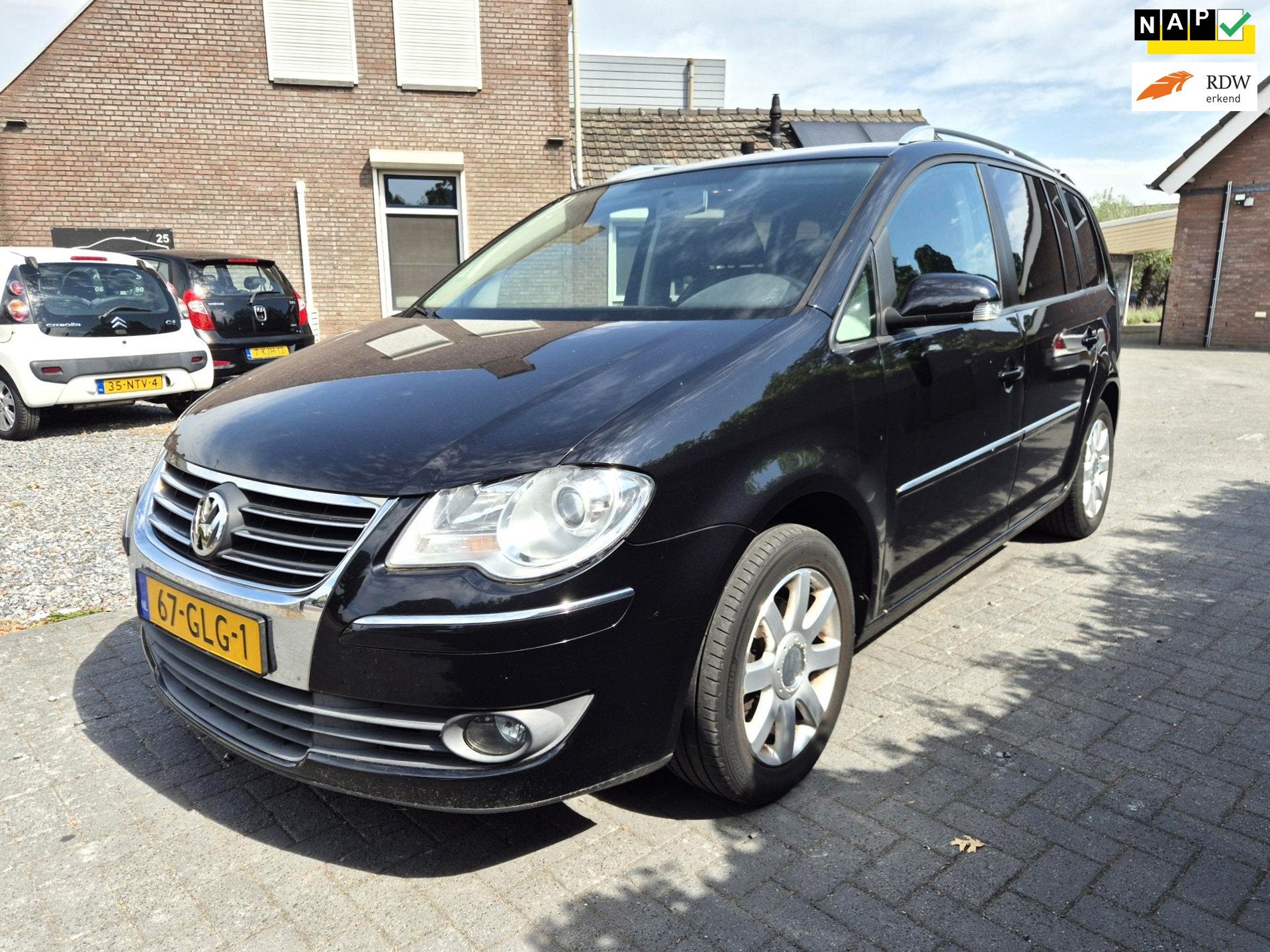 Volkswagen Touran 1.4 TSI Highline Automaat Airco Cruise, Stof, 4 cilinders, Zwart, Origineel Nederlands