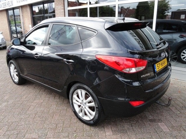 Hyundai Ix35 2.0i i-Catcher Airco, Auto's, Gebruikt, Zwart, 4 cilinders, Handgeschakeld