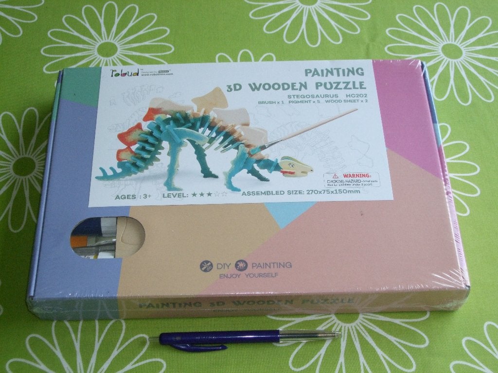 Nieuw in seal: Stegosaurus - schilder een 3D houten puzzel, 10 tot 50 stukjes, Nieuw, Ophalen of Verzenden, Van hout