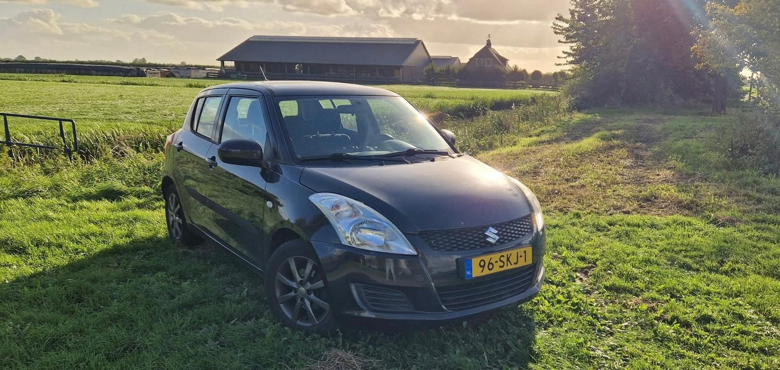 Suzuki Swift 1.2 5-D 2011 Zwart, Auto's, Voorwielaandrijving, Stof, 4 cilinders, 400 kg