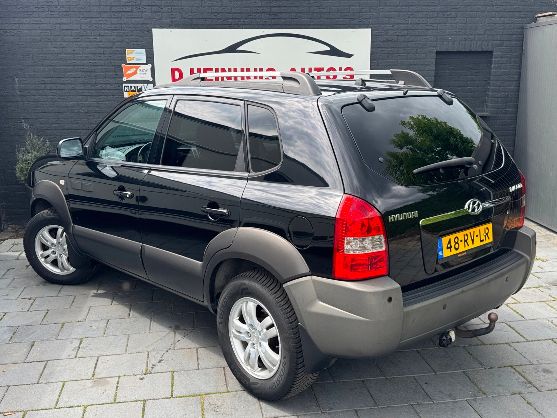 Hyundai Tucson 2.0i Dynamic, Stof, Gebruikt, Zwart, 4 cilinders