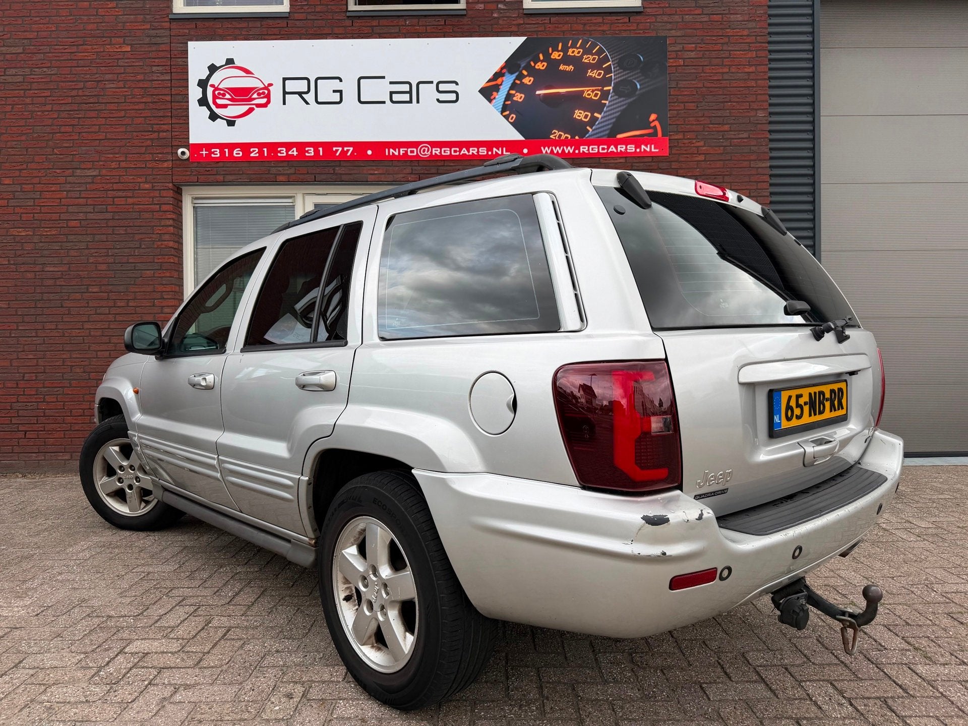 Jeep Grand Cherokee 4.7i V8 Overland High Output / Pano / Le, Automaat, Gebruikt, Met garantie (alle), 1969 kg