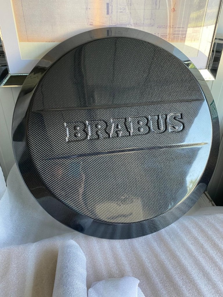Brabus wheelcover achterplaat CARBON W463/W464 NIEUW !!!, Auto-onderdelen, Achterklep, Nieuw, Ophalen of Verzenden, Achter