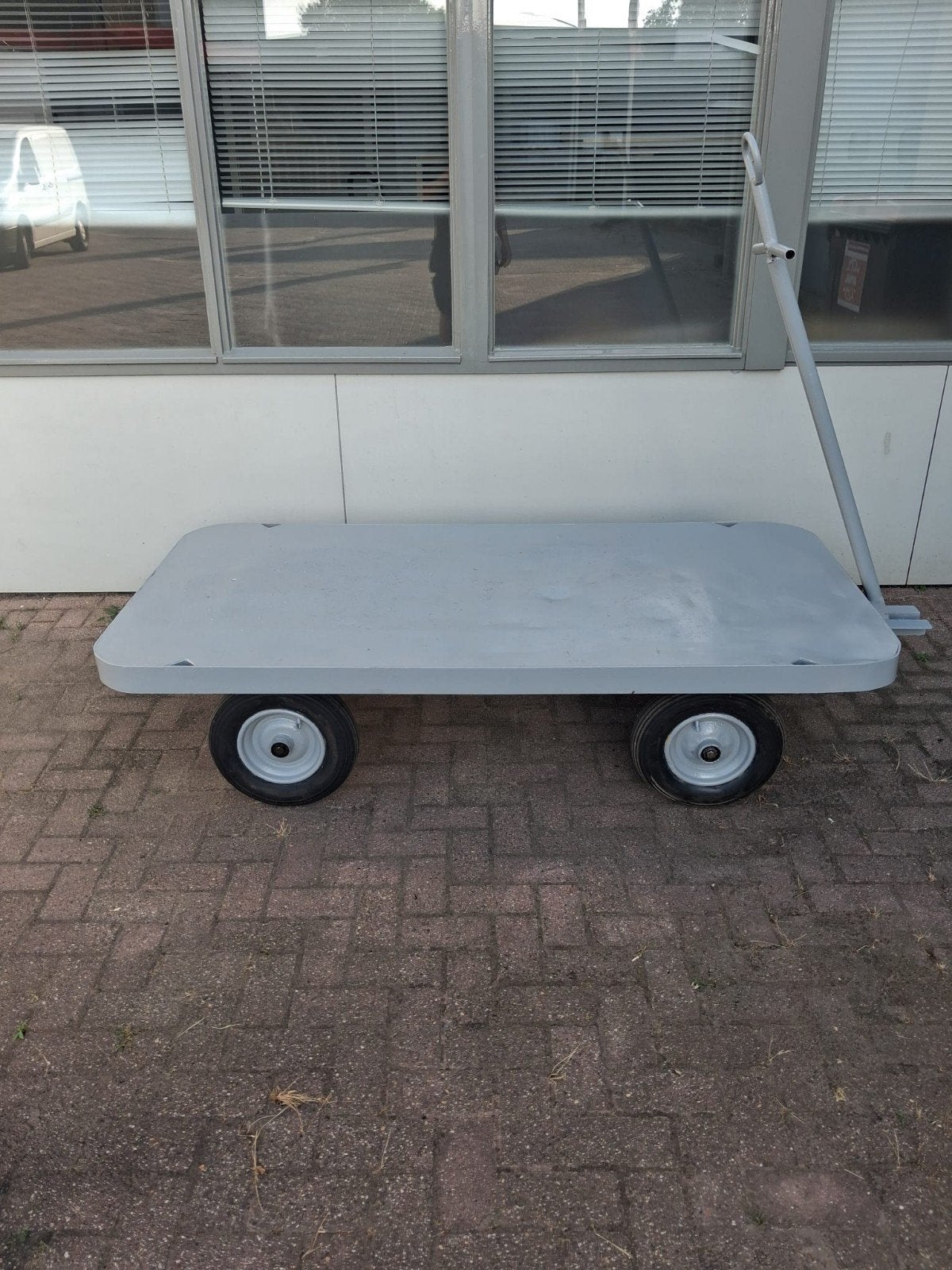 Transportwagen Platte Kar, Ophalen