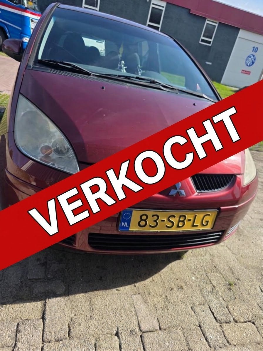 Mitsubishi Colt 1.3 Rood (2005) 5-deurs – Lage km stand, Auto's, 31 €/maand, Colt, Origineel Nederlands, Handgeschakeld