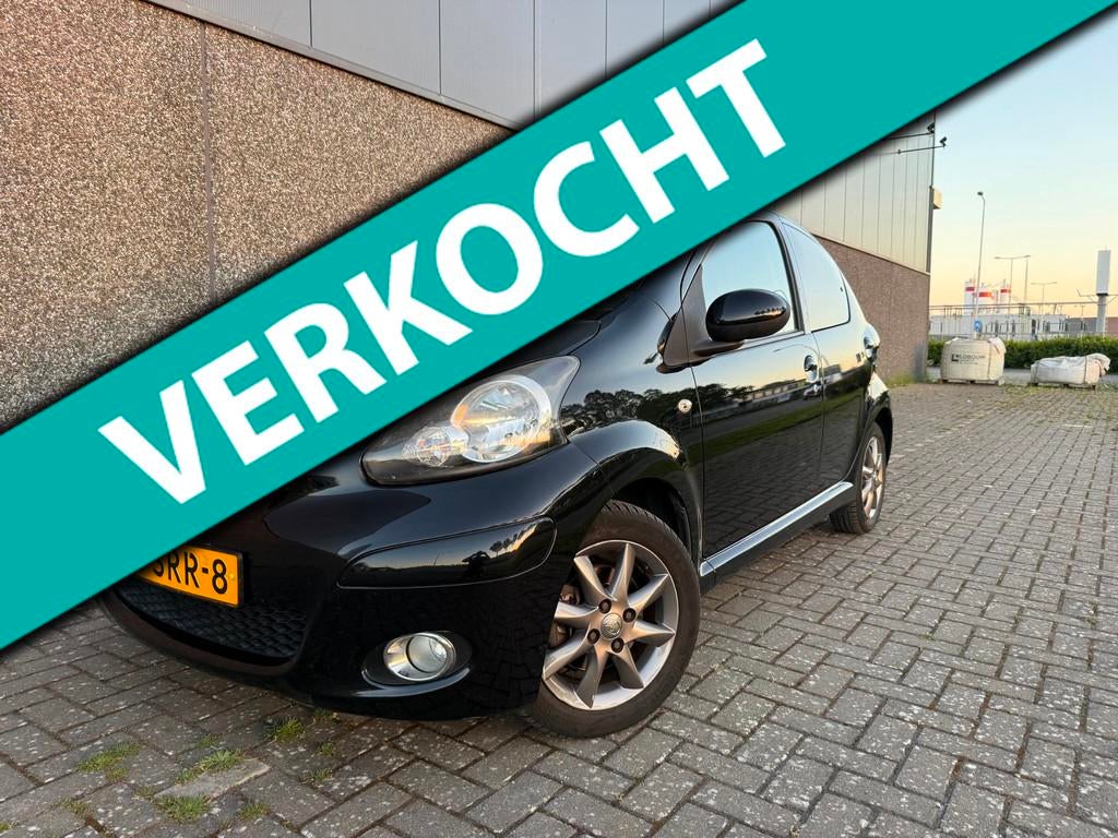 Toyota Aygo 1.0-12V Dynamic Navigator/NIEUWE APK en BEURT!, Voorwielaandrijving, Euro 5, Stof, Gebruikt