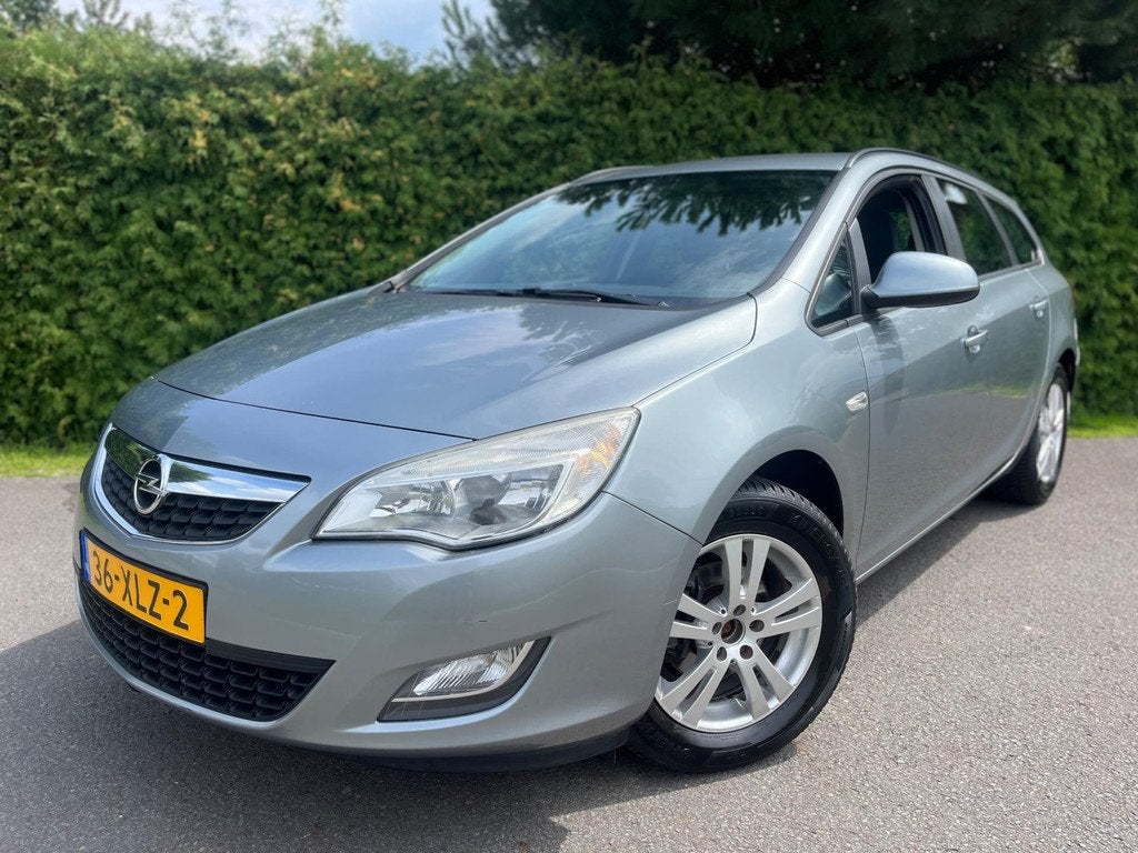 Opel Astra Sports Tourer 1.4 Business + NAVIGATIE AIRCO NAP, Voorwielaandrijving, Euro 5, 101 pk, Gebruikt