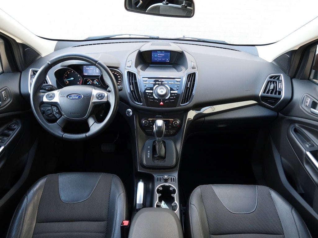 Ford Kuga 1.6 Titanium Pl. 4WD, Auto's, Gebruikt, Zwart, 4 cilinders, Leder en Stof