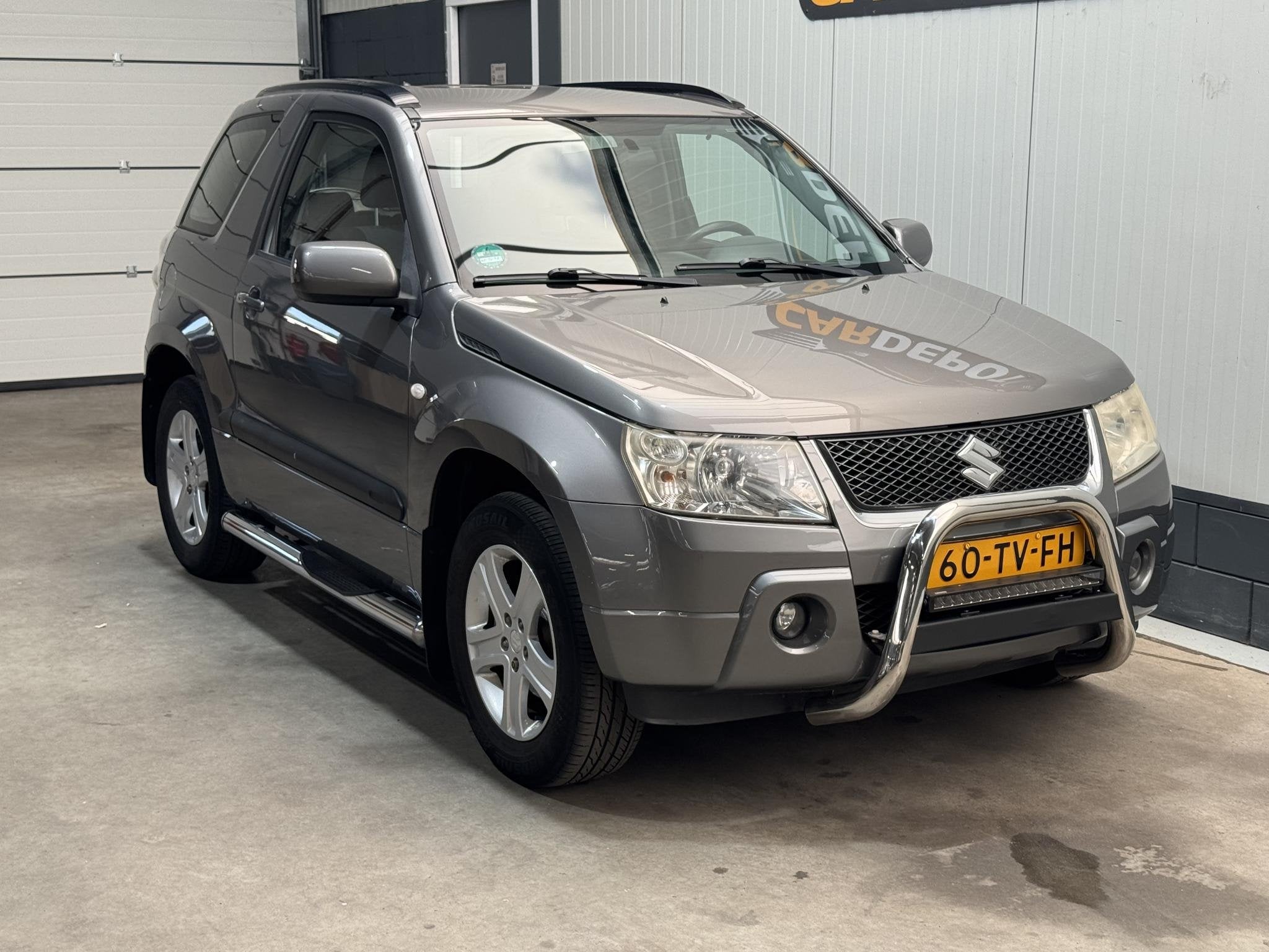 Suzuki Grand Vitara 1.6-16V Exclusive, Auto's, 1345 kg, Stof, Gebruikt, 4 cilinders