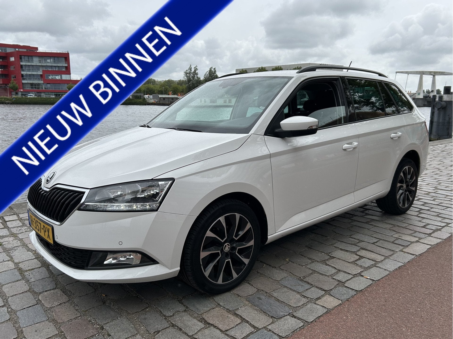 Skoda Fabia Combi 1.0 TSI Business Edition Airco/ECC Navi PD, Auto's, Stof, Gebruikt, 1036 kg, Origineel Nederlands