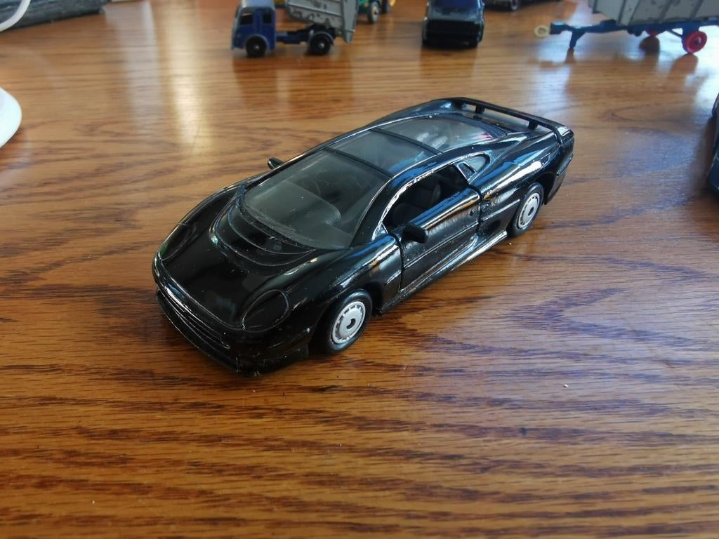 Zwarte Jaguar XJ220 modelauto., Ophalen of Verzenden, Zo goed als nieuw, Auto, Overige merken
