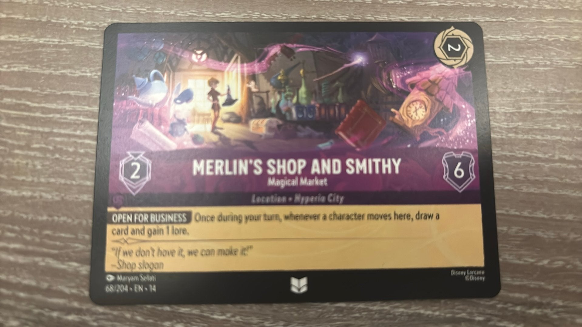 Disney Lorcana Merlin’s shop and smithy 68-204 14HPC nonfoil, Ophalen of Verzenden, Zo goed als nieuw