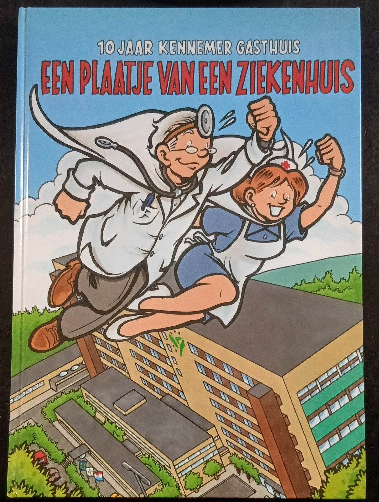 10 Jaar Kennemer Gasthuis: Een Plaatje van een Ziekenhuis, Eén stripboek, Ophalen of Verzenden, Zo goed als nieuw