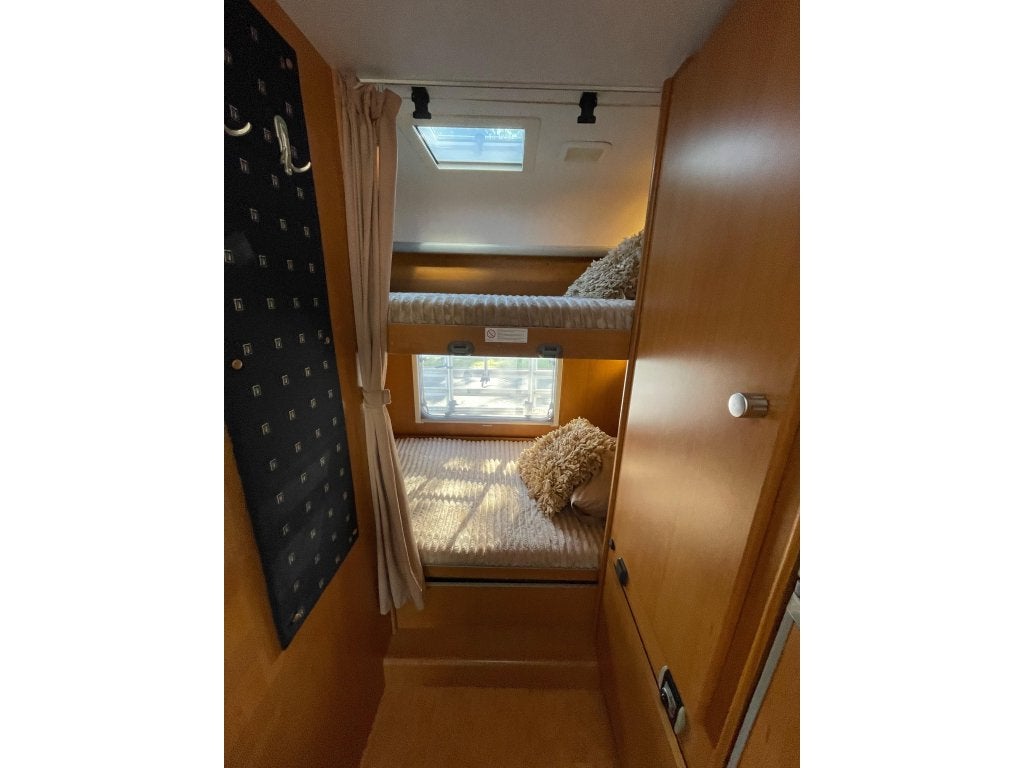 Dethleffs Fortero 6785 ALKOOF+STABELBED GEZINSCAMPER CAMERA, Automaat, Ringverwarming, Ford, 6 tot 7 meter