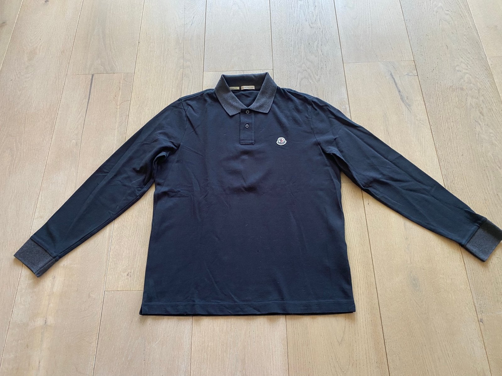 Moncler M lange mouwen zwart grijs nieuwstaat, Ophalen of Verzenden, Zo goed als nieuw, Maat 48/50 (M), Zwart