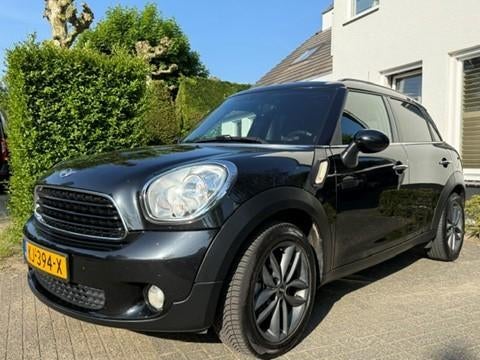 Mini Countryman 1.6D 112pk Zwart Mooi!, Auto's, Voorwielaandrijving, Zwart, Leder en Stof, 140 €/maand