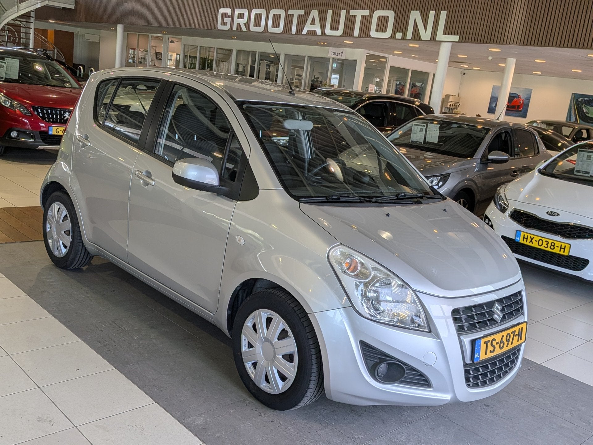Suzuki Splash 1.0 VVT Exclusive EASSS Airco, Stuurbekrachtig, Auto's, Euro 5, Stof, Gebruikt, 31 €/maand