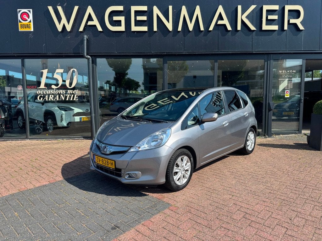 Honda Jazz 1.4 Hybrid Business Mode AUT|PANO|Cruise|DealerOH, Auto's, Honda, Euro 5, Stof, Gebruikt, 4 cilinders