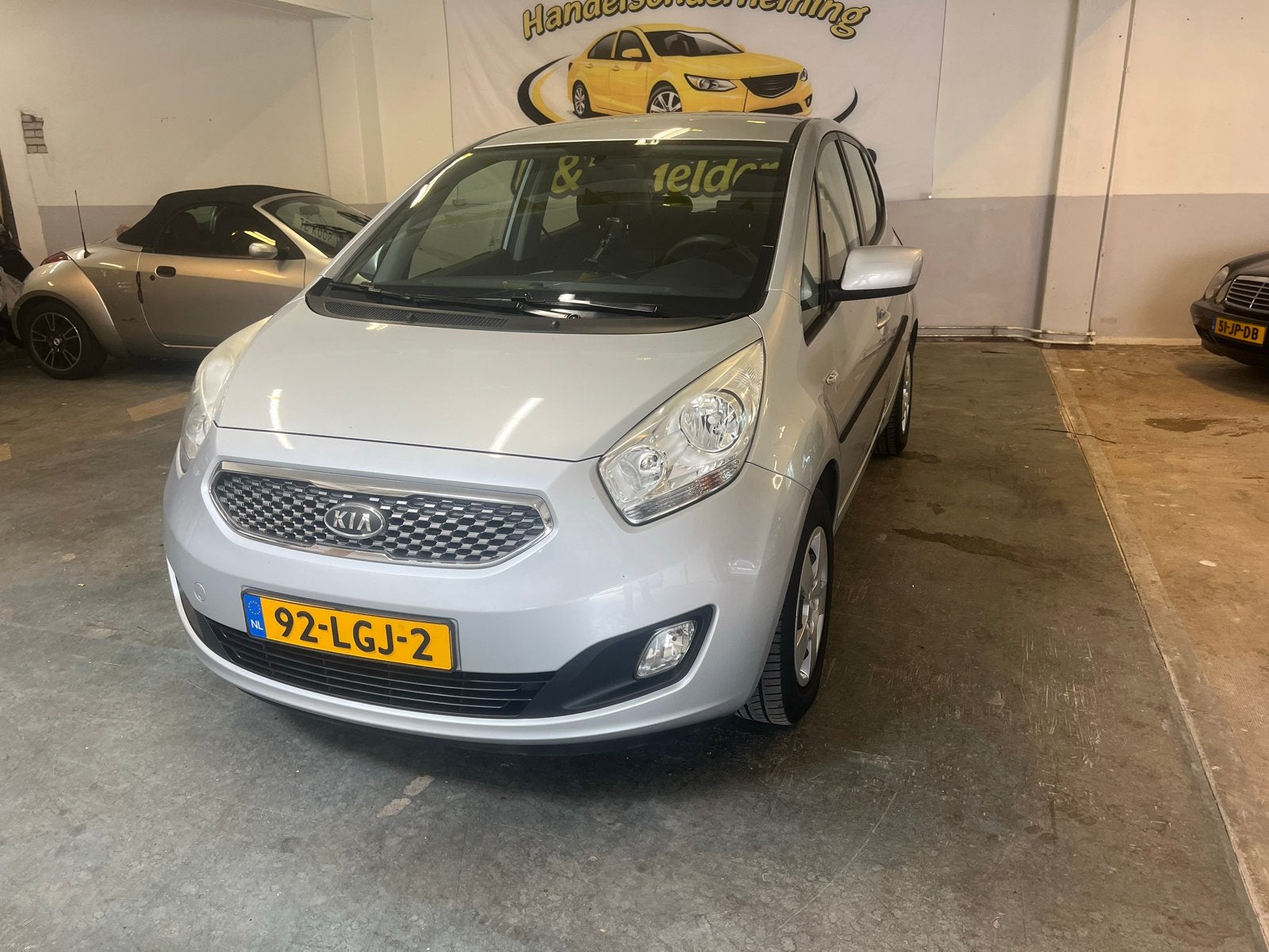 Kia Venga 1.4 Cvvt 90pk 2010 Grijs “Weinig KM”, Auto's, Voorwielaandrijving, Stof, Zwart, 4 cilinders