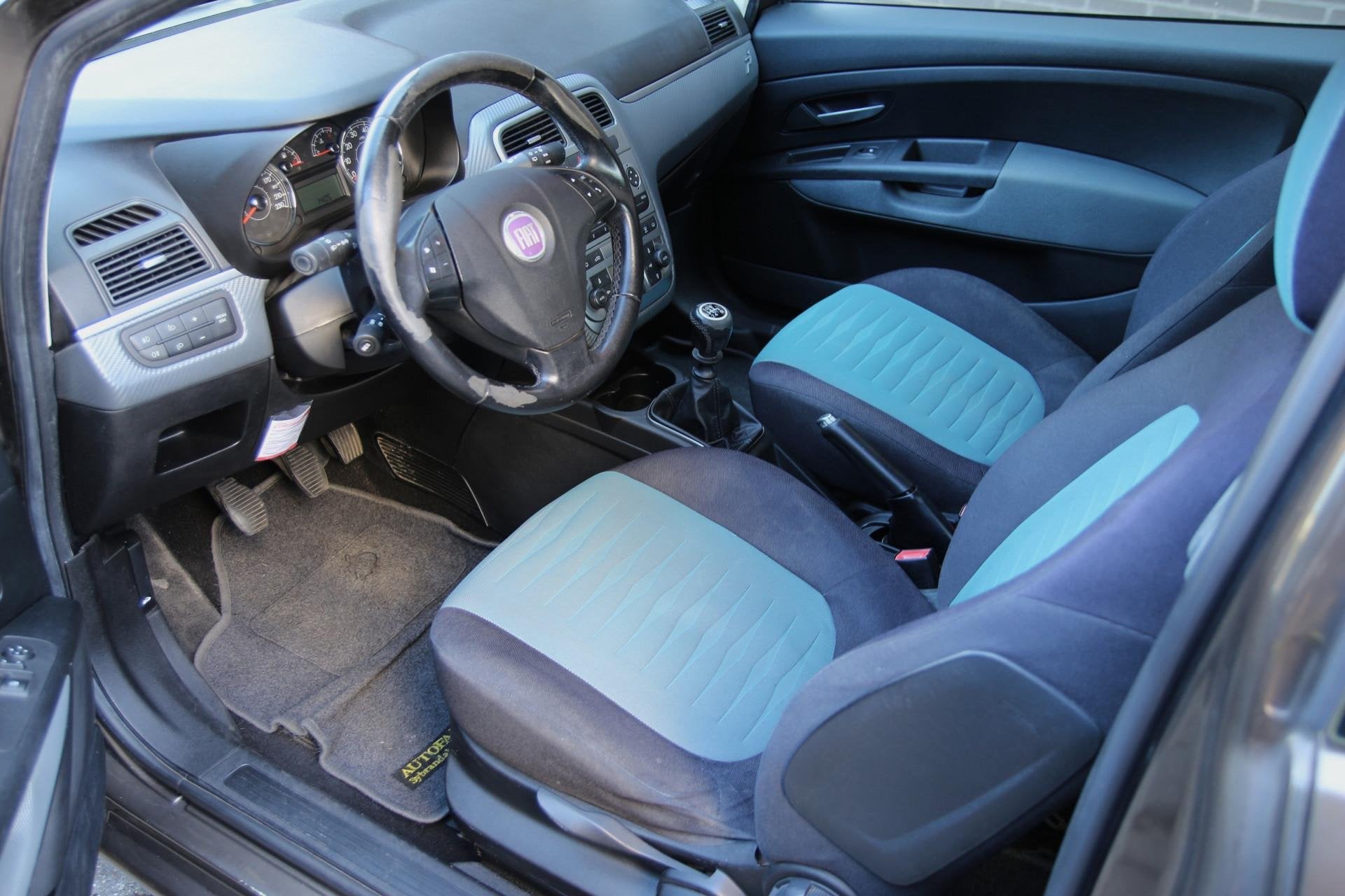 Fiat Grande Punto 1.4 77pk Edizione Lusso | NL-auto | Climat, Voorwielaandrijving, Stof, Zwart, 4 cilinders