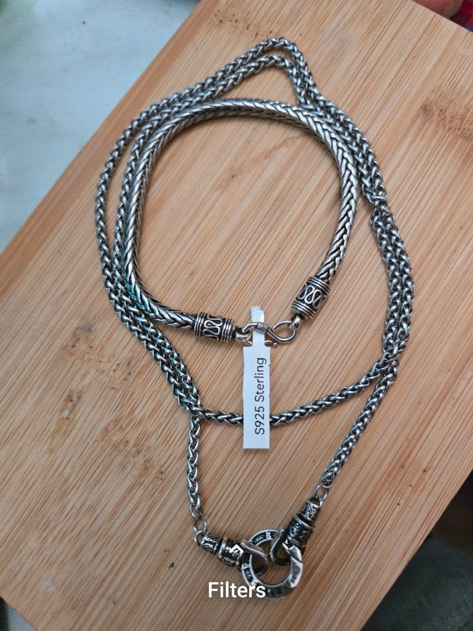 Zilvere koningsketting en armband, Ophalen