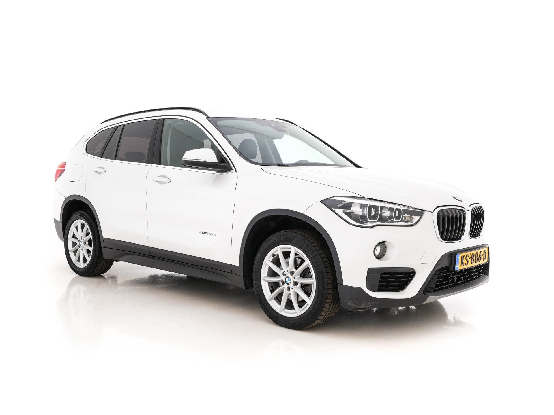 BMW X1 sDrive16d Centennial High Executive *LEATHER | NAVI-F, Auto's, Gebruikt, 116 pk, Wit, Bedrijf