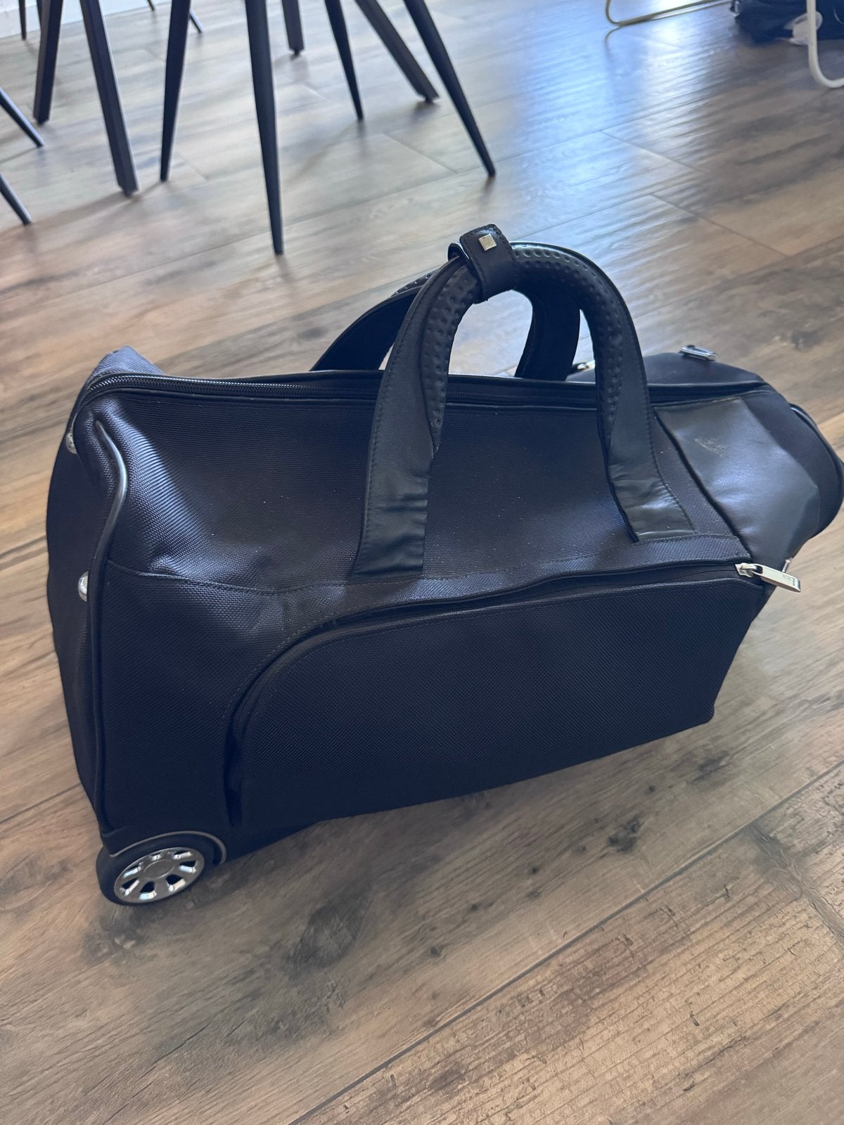 TUMI tas met Wieltjes en Handgreep, Ophalen, 40 tot 60 cm, Gebruikt, 20 tot 30 cm