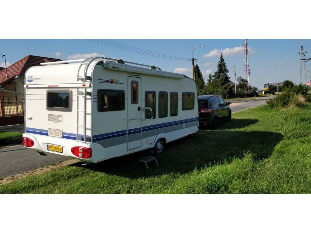 Hobby Excelsior TMF (1054096), Caravans en Kamperen, Caravans, Particulier, tot en met 4, 1000 - 1250 kg, Rondzit, Hobby, 2 aparte bedden