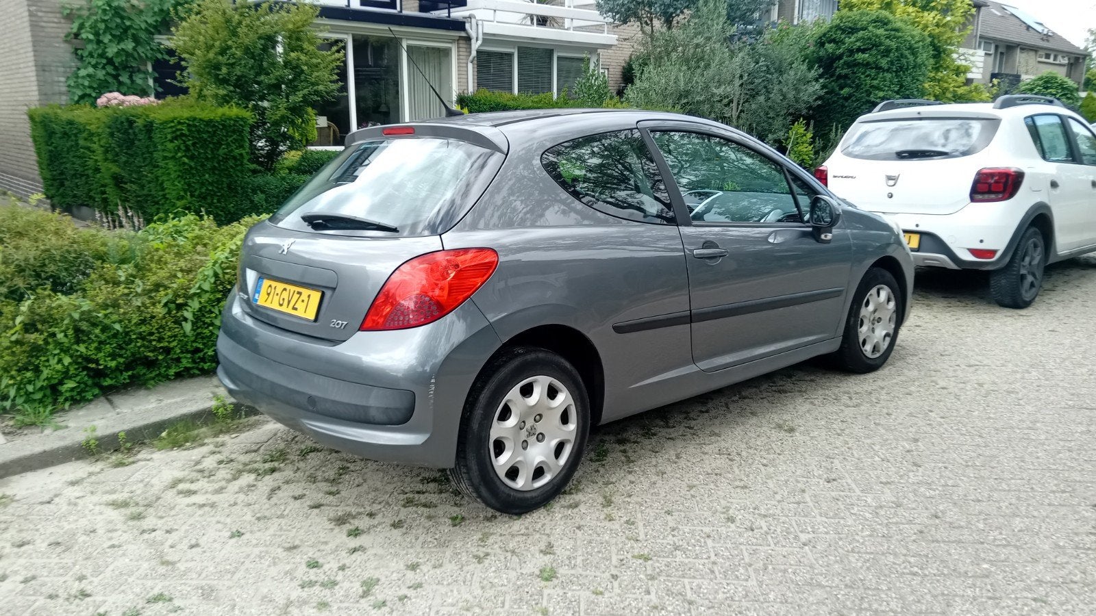 Peugeot 207 1.4 VTI 16V 3DRS 2008 Grijs, Auto's, Stof, Zwart, 49 €/maand, Origineel Nederlands