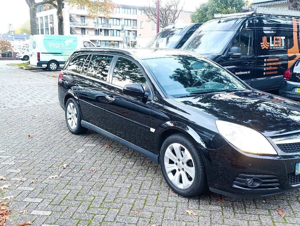 Opel Vectra 1.8 16V St.wgn 2009 Zwart, Auto's, 4 cilinders, 1796 cc, Origineel Nederlands, Handgeschakeld
