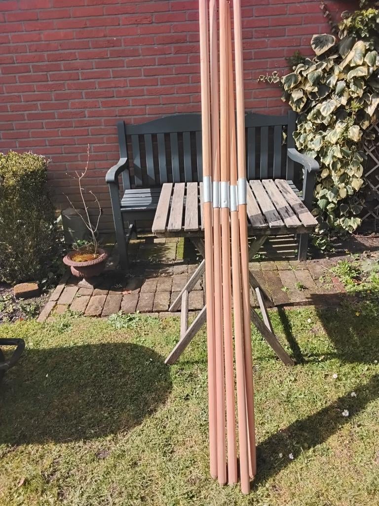 Houten windscherm stokken, Ophalen