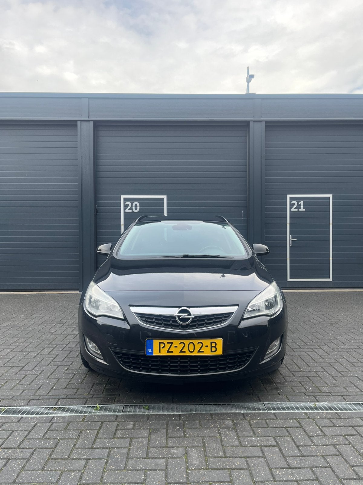 Opel Astra 1.4 74KW ST 2011, Auto's, Voorwielaandrijving, 4 cilinders, 100 pk, Zwart
